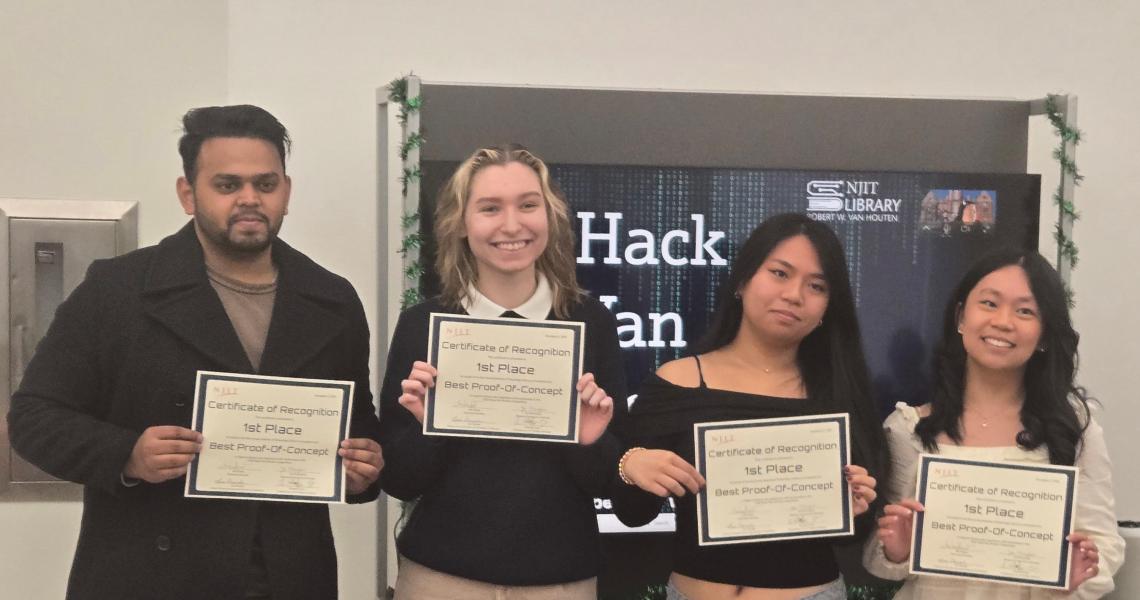 Four people holding certificates for 1st Place.